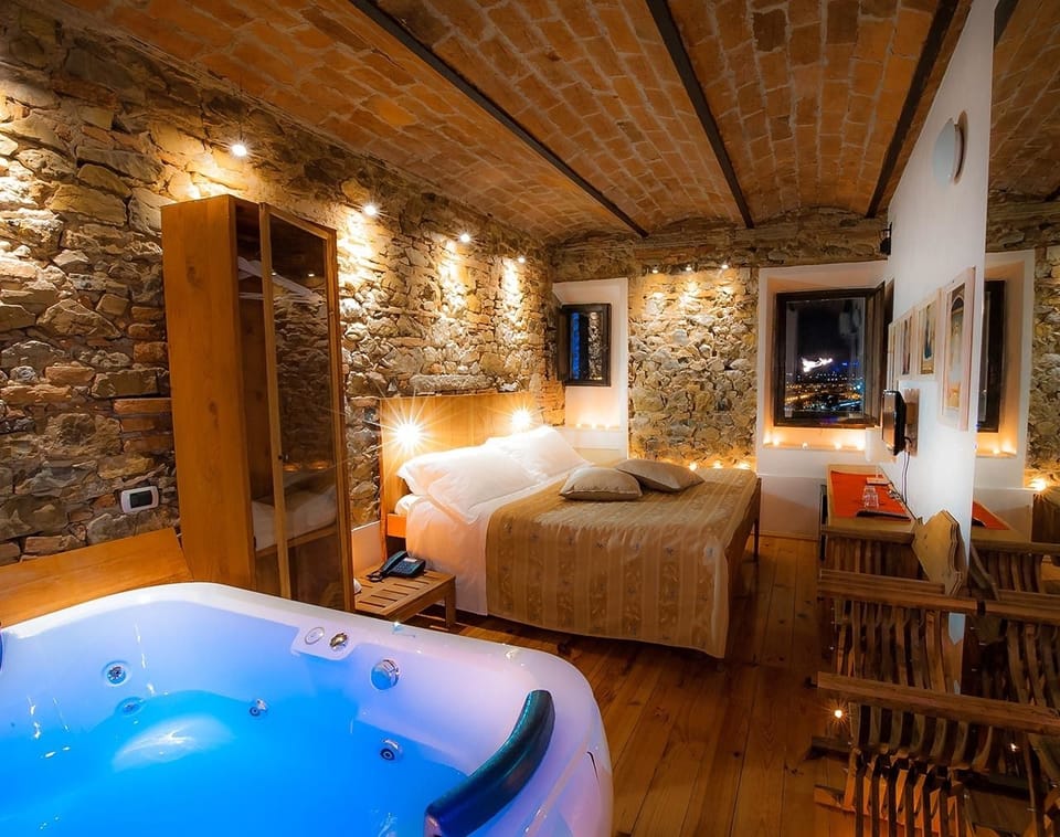 Deluxe Double Room, 1 King Bed, Jetted Tub | Minibar, desk, WiFi (free), individually decorated