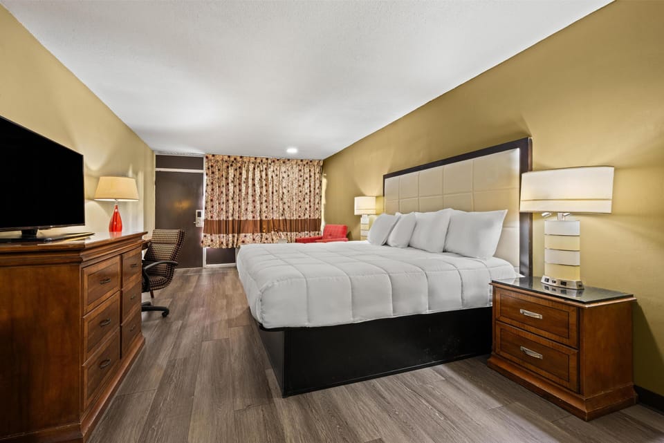 Blackout drapes, soundproofing, iron/ironing board, free WiFi