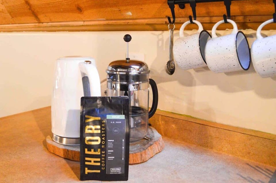 We provide coffee from a local roaster in Redding called Theory. We believe using the French press method provides optimal brewing for this blend. 
