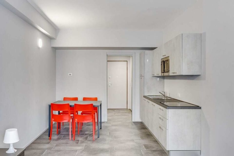 one-room apartment which keep together night zone, kitchen and living room in a simple and welcoming environment