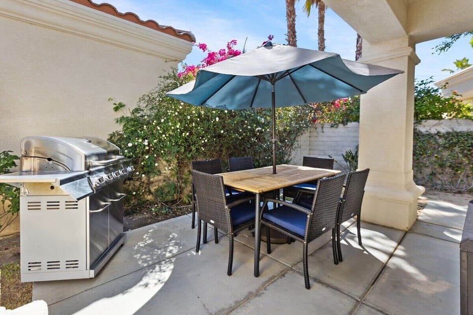 Share meals around this solid wood table with seating for the whole group.