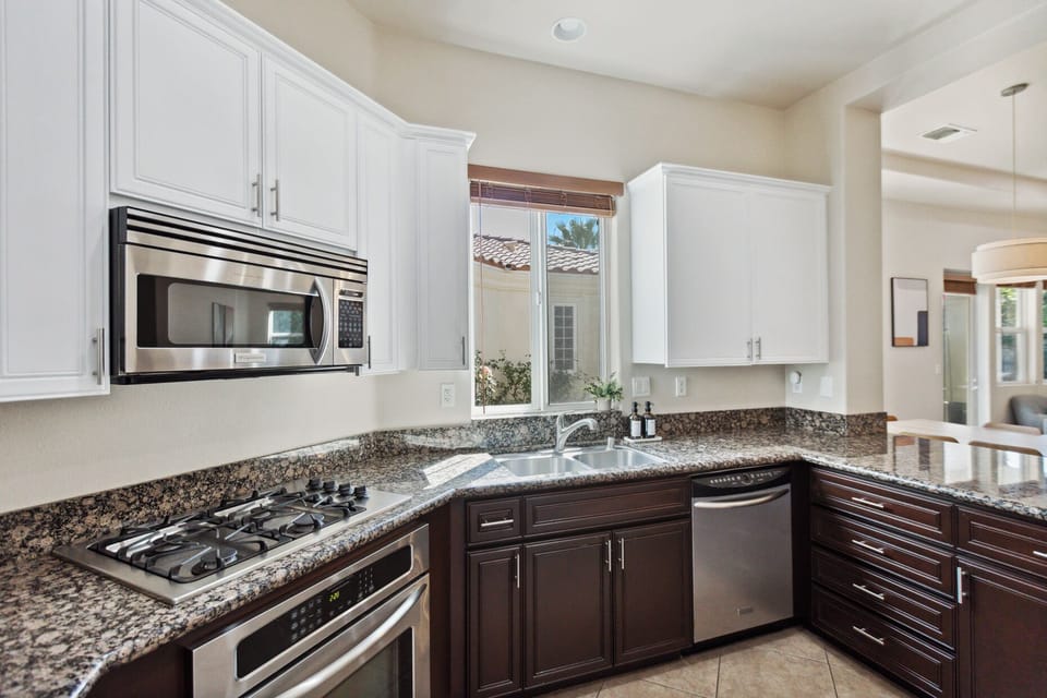 Everything you need to whip up meals with granite counters and gas cooking.