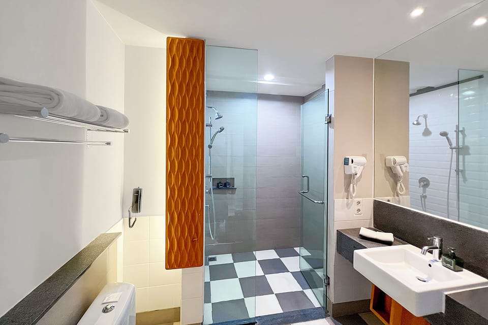 Shower, free toiletries, hair dryer, slippers