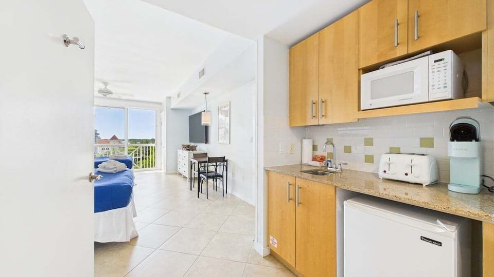 Fully stocked kitchenette with coffee essentials