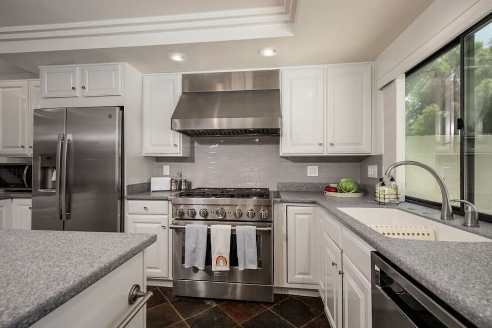 Prepare your meal in the beautiful kitchen with a 6-burner professional range, ultra-quiet dishwasher, full size refrigerator, microwave, and all the dishes, utensils, pots and pans necessary to make you feel at home.