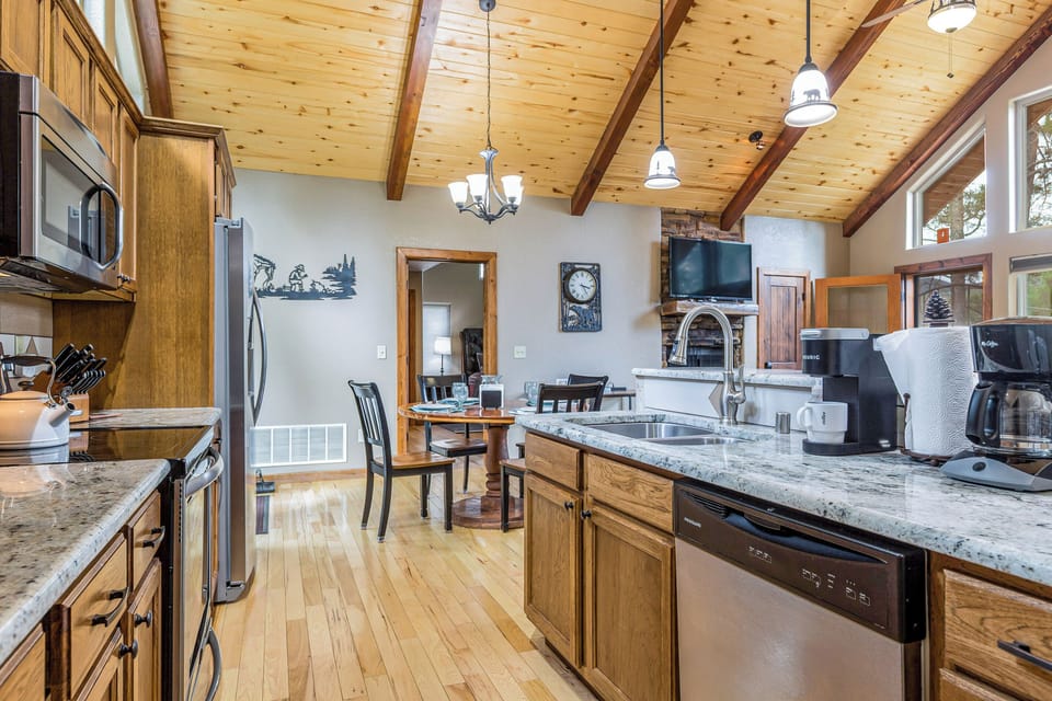 The kitchen melds right into the living and dining spaces