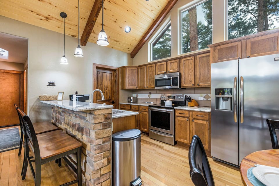 The kitchen has all stainless appliances