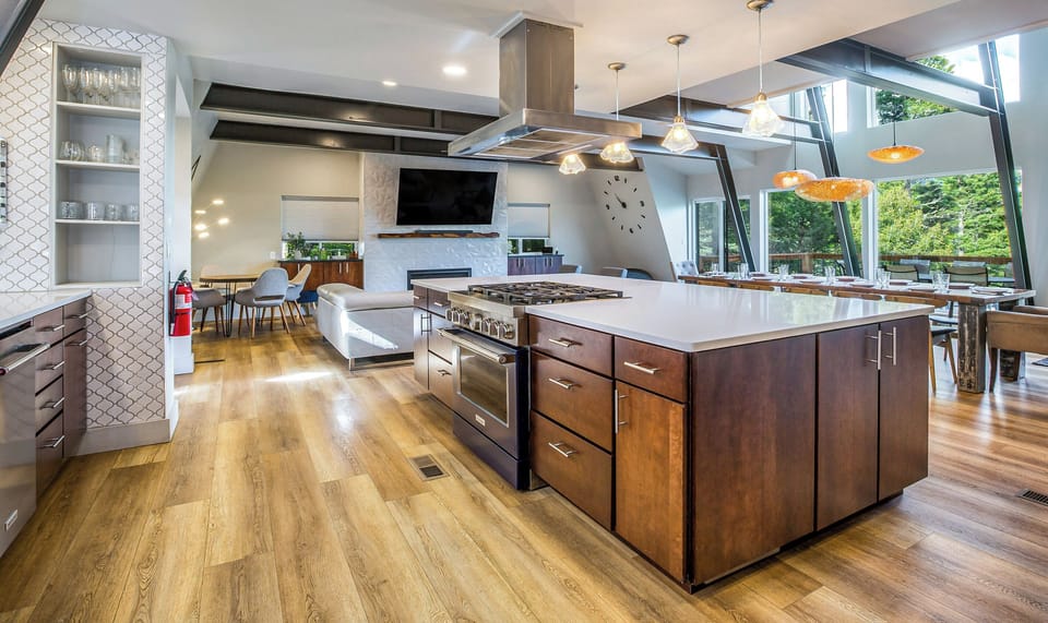 This beautiful kitchen flows seamlessly into the living and dining room spaces