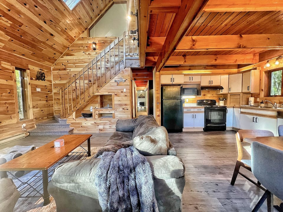 Open 2-story floor plan with giant windows and boasting light. 