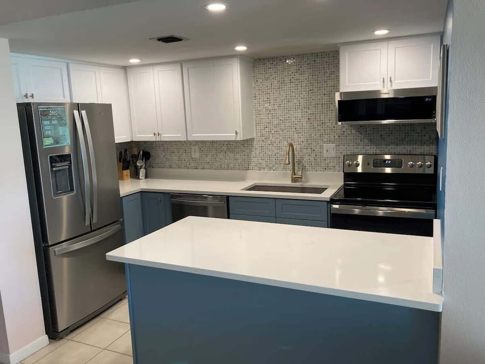  Prepare your favorite meals with ease in our modern kitchen, complete with top-of-the-line appliances and a cozy ambiance for gathering.