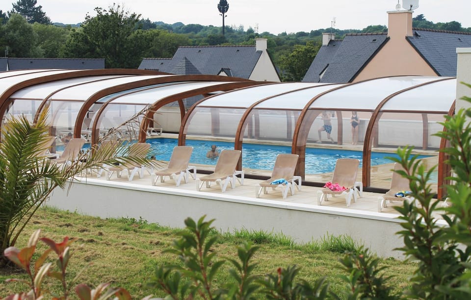 Lounge by the pool in the sunshine.