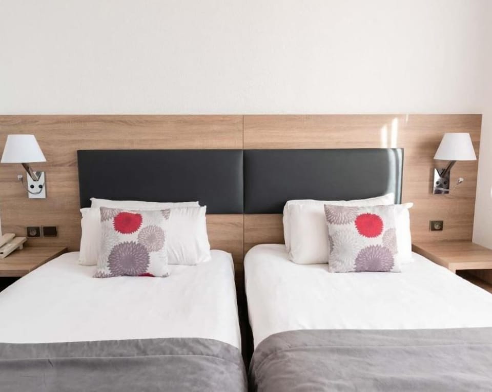 Relax on the comfy bed after a day outside.