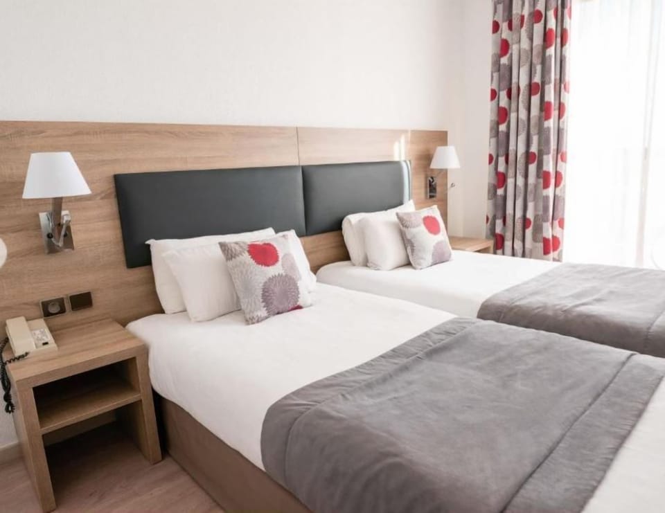 Get a peaceful night sleep in our cozy bedroom.
