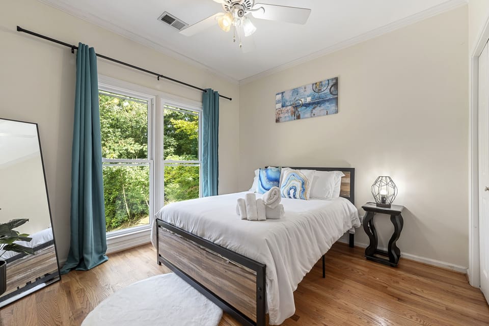 Comfy Full-size bed with memory foam mattress.