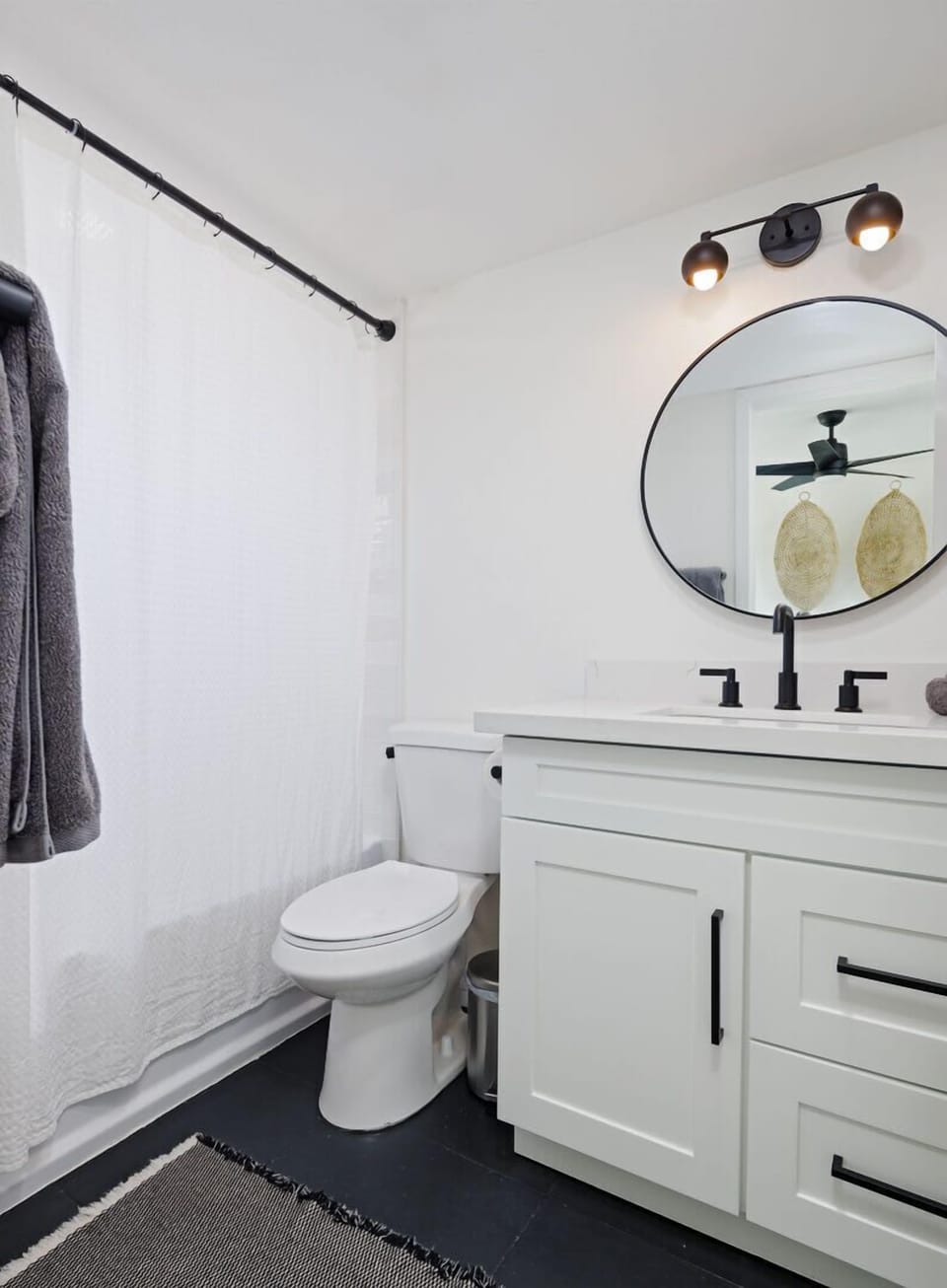 2nd bathroom in hallway with shower tub combo