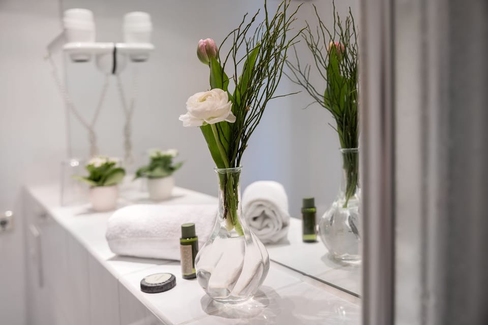 Bathtub, hair dryer, towels