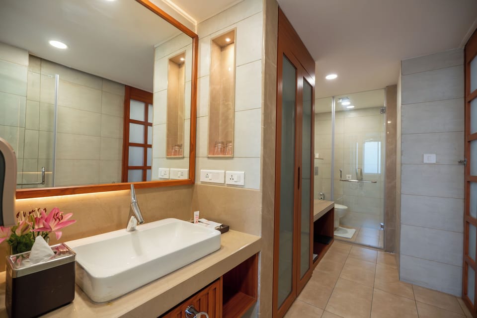 Designer toiletries, hair dryer, bathrobes, slippers
