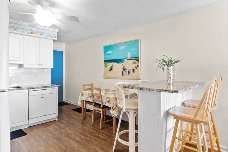 Dining table plus breakfast bar seating for meals together