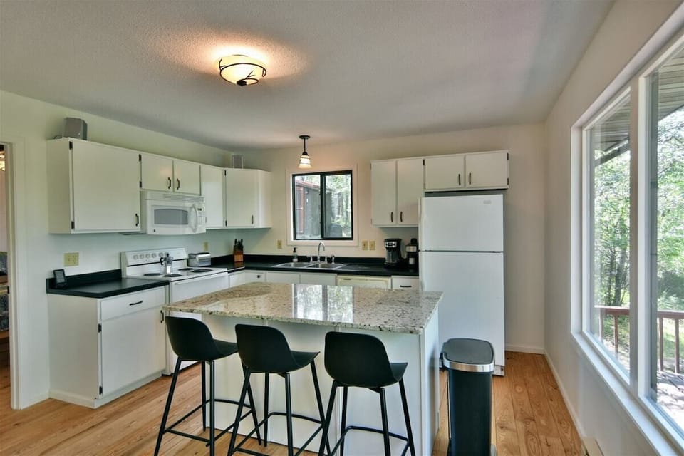A large island in the kitchen with seating