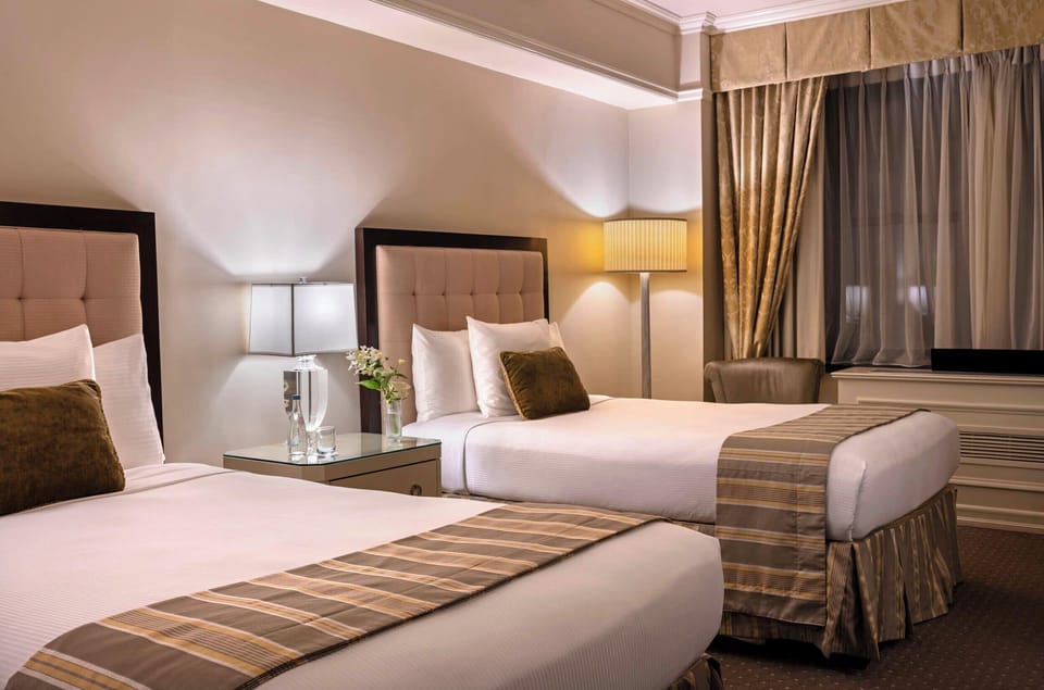 Premier Room, 2 Double Beds | Premium bedding, down comforters, in-room safe, desk