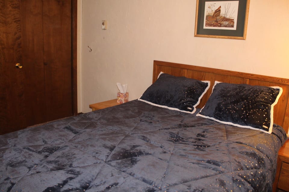 Rest comfortably in the bedroom's queen-sized sleep number bed 