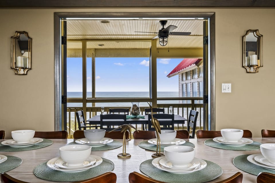 Step out onto the spacious porch deck, just meters away from the ocean, and take in the stunning views while enjoying the coastal breeze.