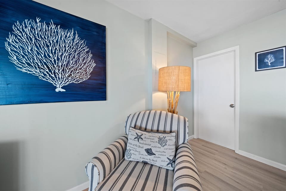 Townhome | Living area | 32-inch flat-screen TV with satellite channels, TV