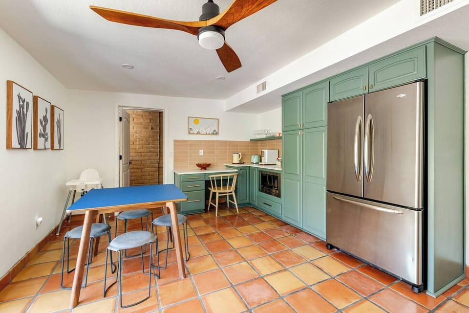The kitchen has seating for 4 along with a full coffee set up - automatic espresso machine and drip coffee maker. Coffee beans (decaf and regular) are both supplied.