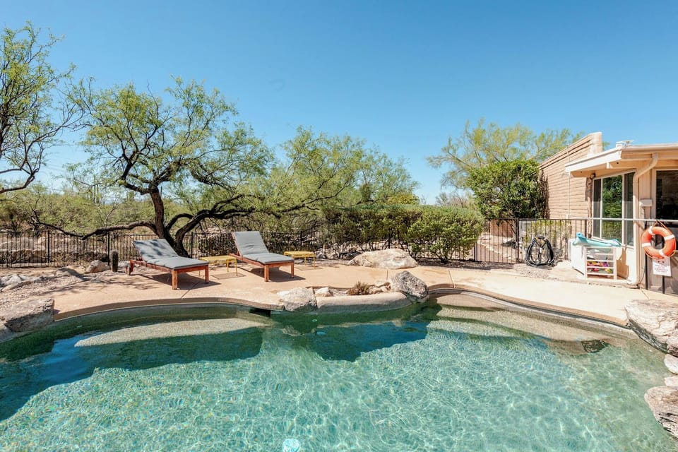 Private desert pool with loungers and a peaceful resort-style vibe