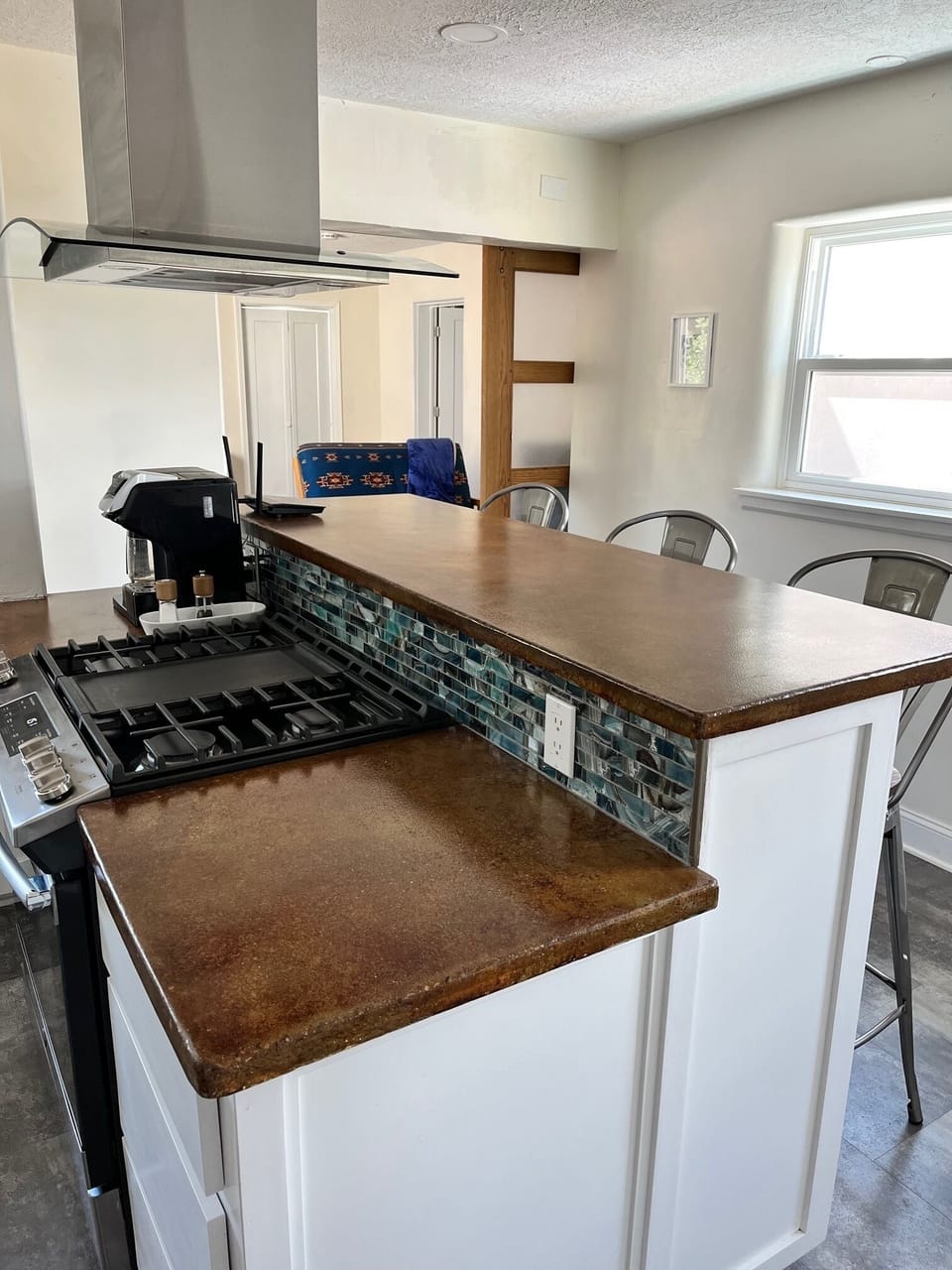 Kitchen with walkway to TV area and back bedroom