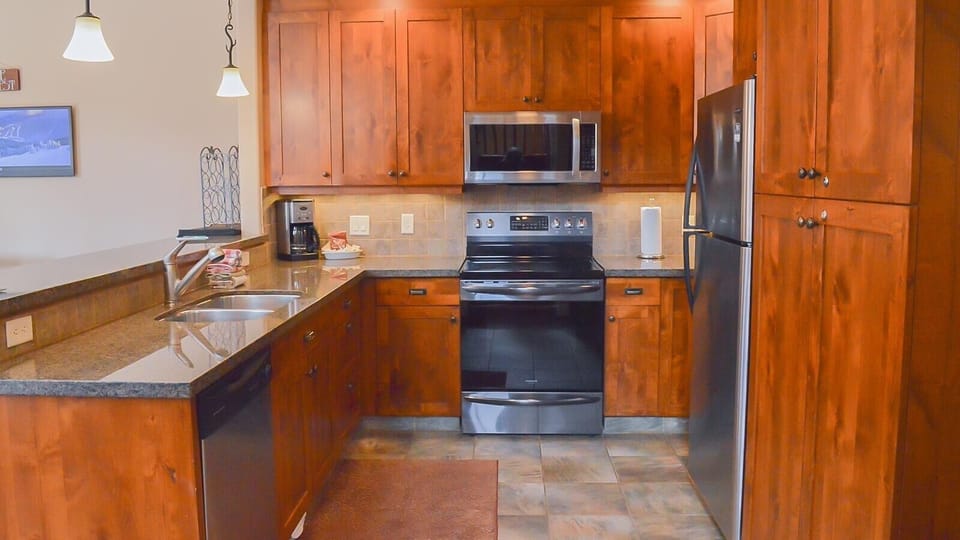 Townhome, 4 Bedrooms | Private kitchen | Coffee/tea maker, fridge, oven, toaster