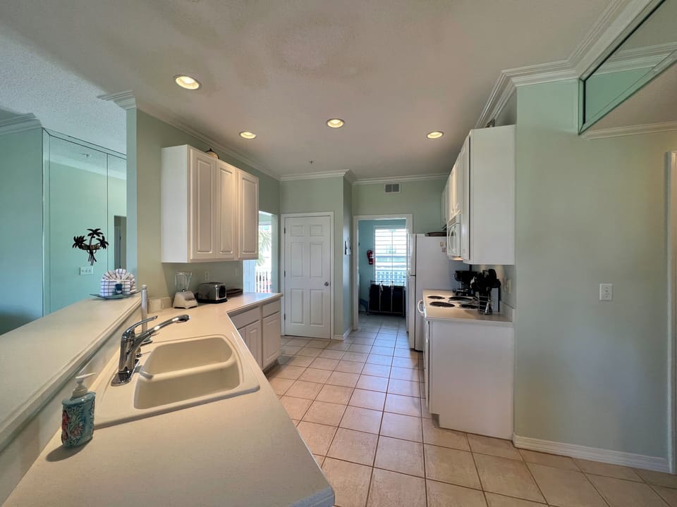 Your fully equipped galley kitchen features everything you need to prepare meals during your stay, with ample counter space and modern appliances.