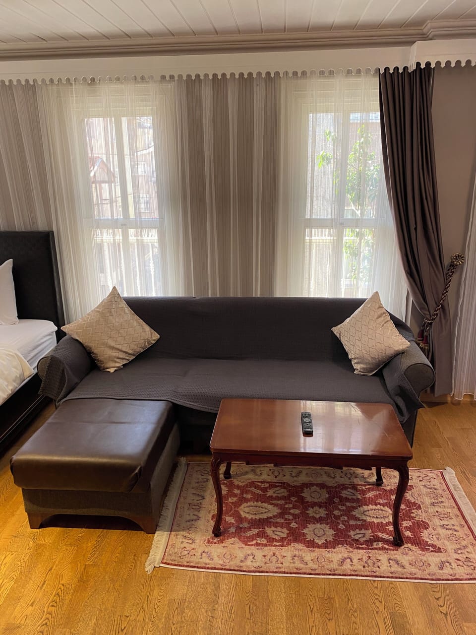 Family Quadruple Room | Living area | 40-inch LED TV with cable channels, TV