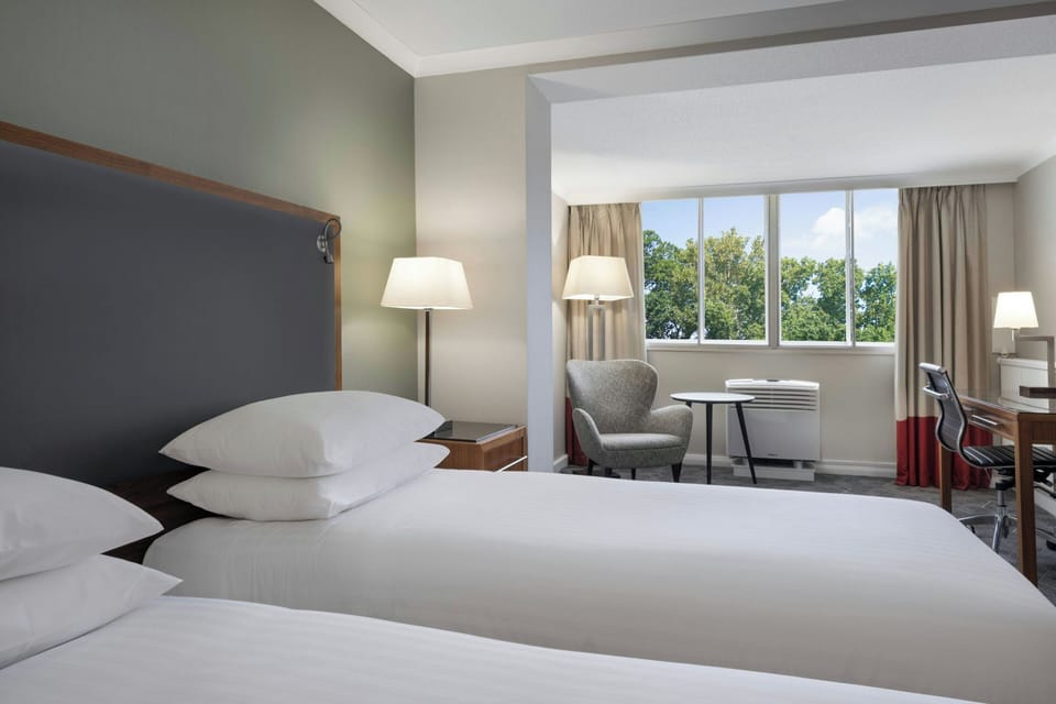 Deluxe Twin Room, 2 Twin Beds | 1 bedroom, premium bedding, pillowtop beds, in-room safe