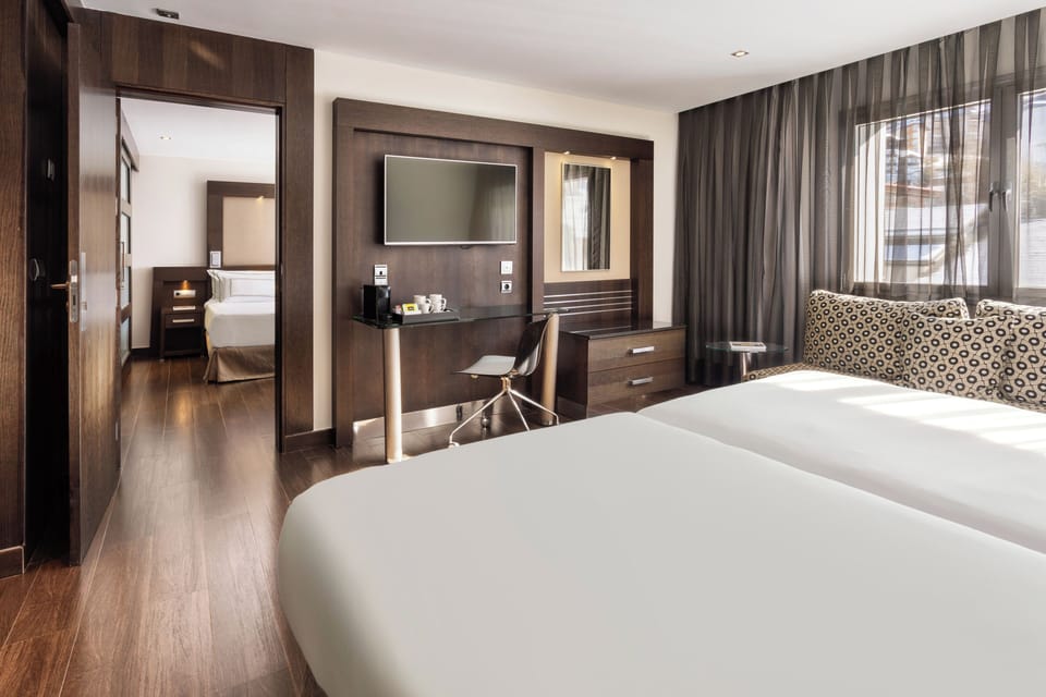 Premium Room (Communicated) | Down comforters, memory foam beds, minibar, in-room safe