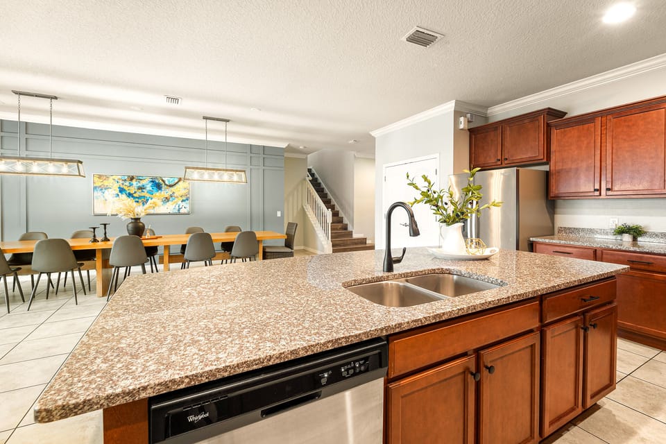 Large island for plenty of counter space, and also bar stool seating.