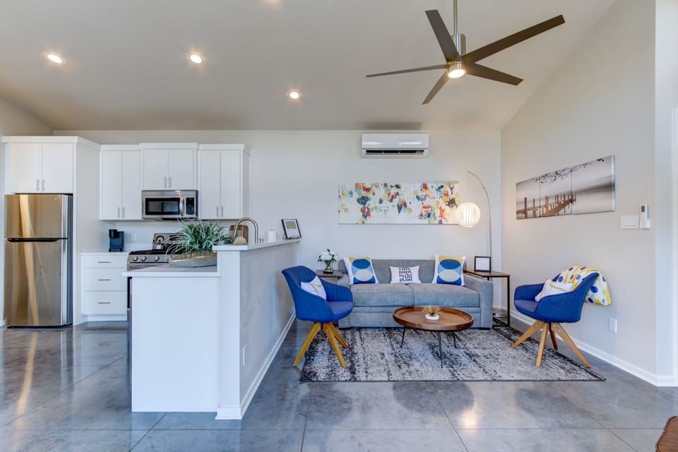 Open living, kitchen & dining.