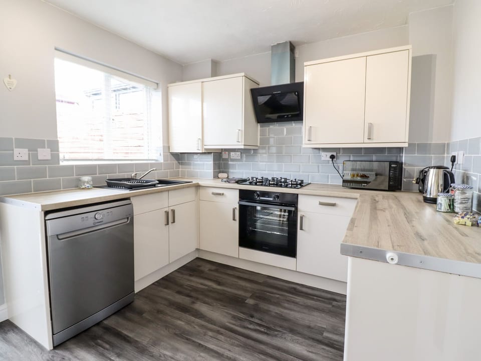 Fridge, dishwasher, electric kettle, toaster