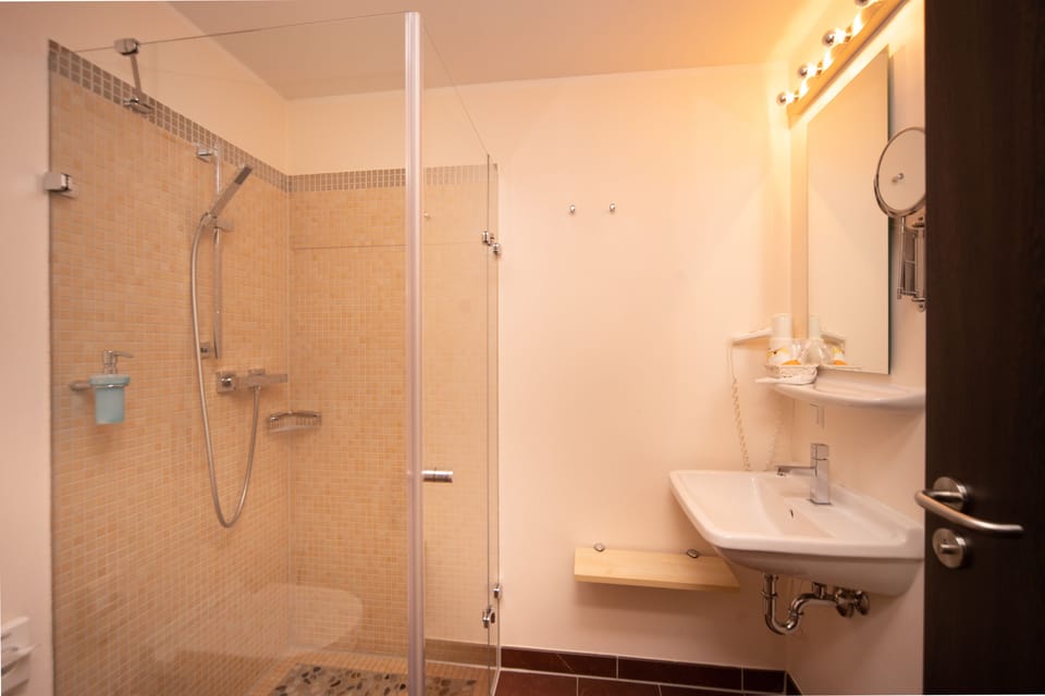 Shower, free toiletries, hair dryer, towels