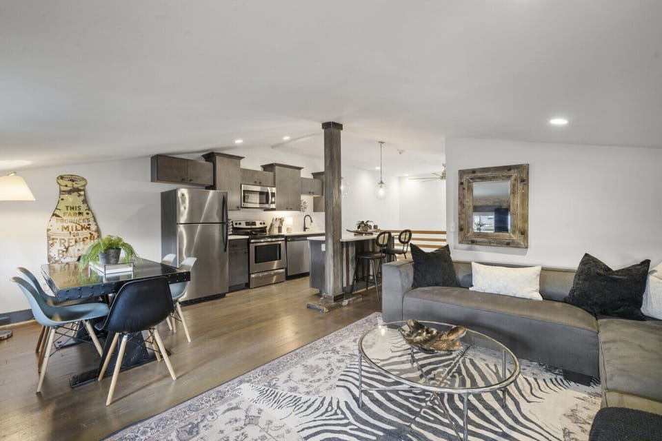 2nd Floor w/ Smart TV connected to Kitchen w/ Dining Room