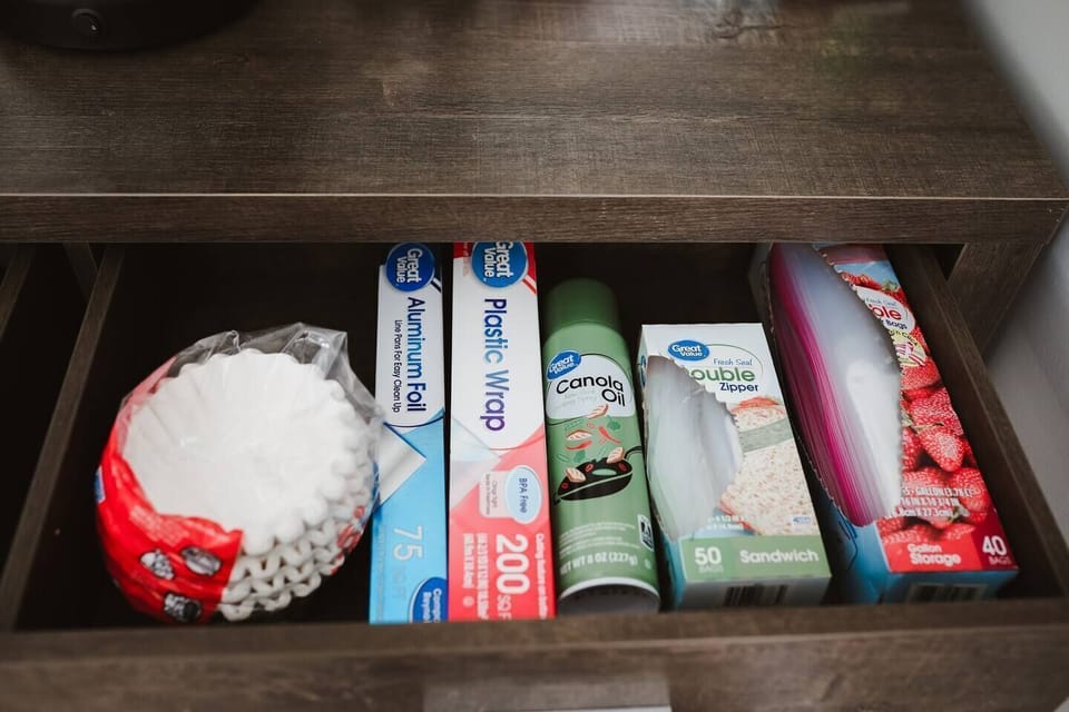 Coffee filters, aluminum foil, plastic wrap, cooking spray, sandwich bags, and gallon bags available
