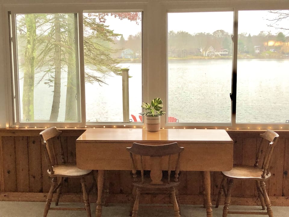 Porch area- perfect for dining & games with the amazing lake views. 
