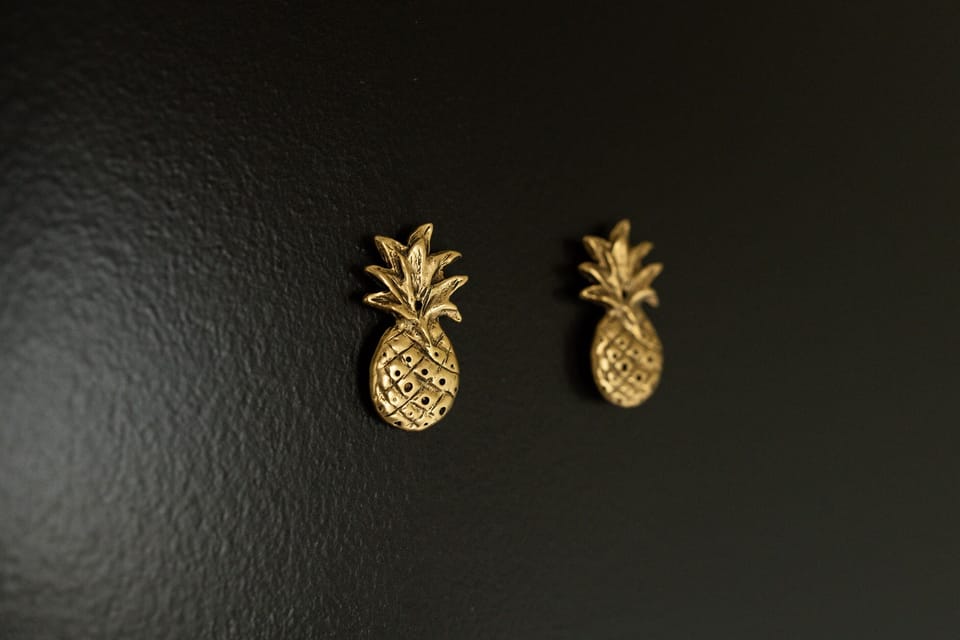 Look for the door with the two pineapple magnets on the right side and enter with your personalized electronic lock code.