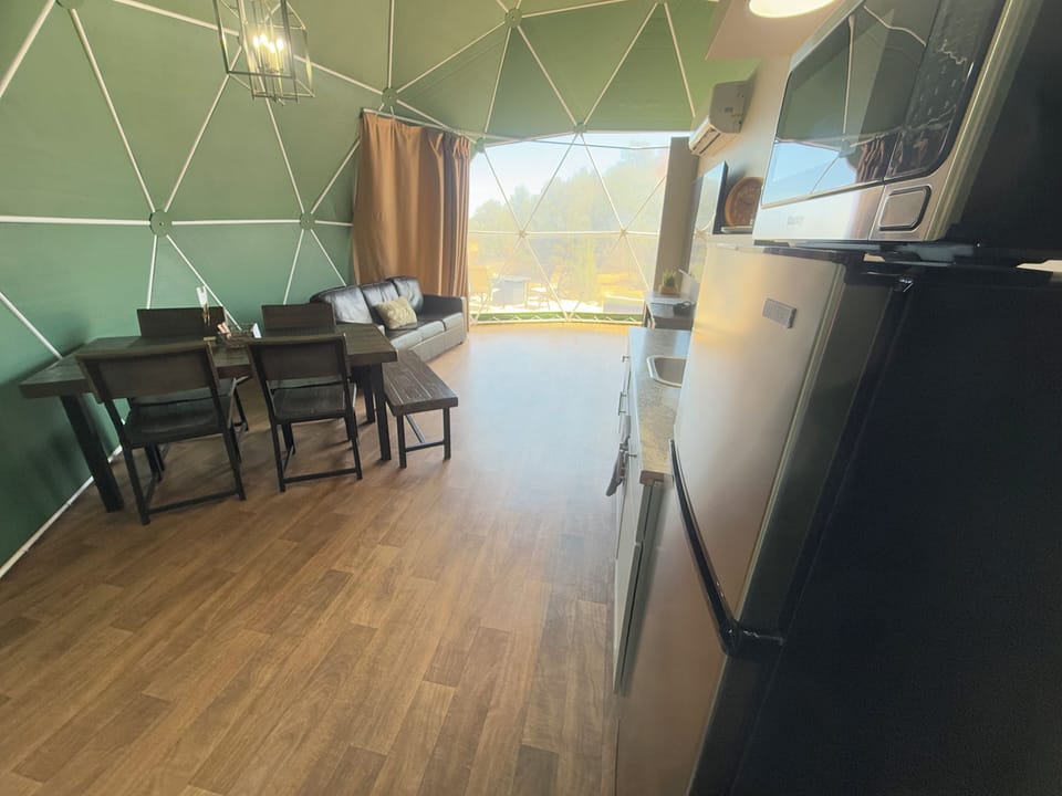 Luxury Dome 4 | Living area | 65-inch LED TV with digital channels, TV, fireplace