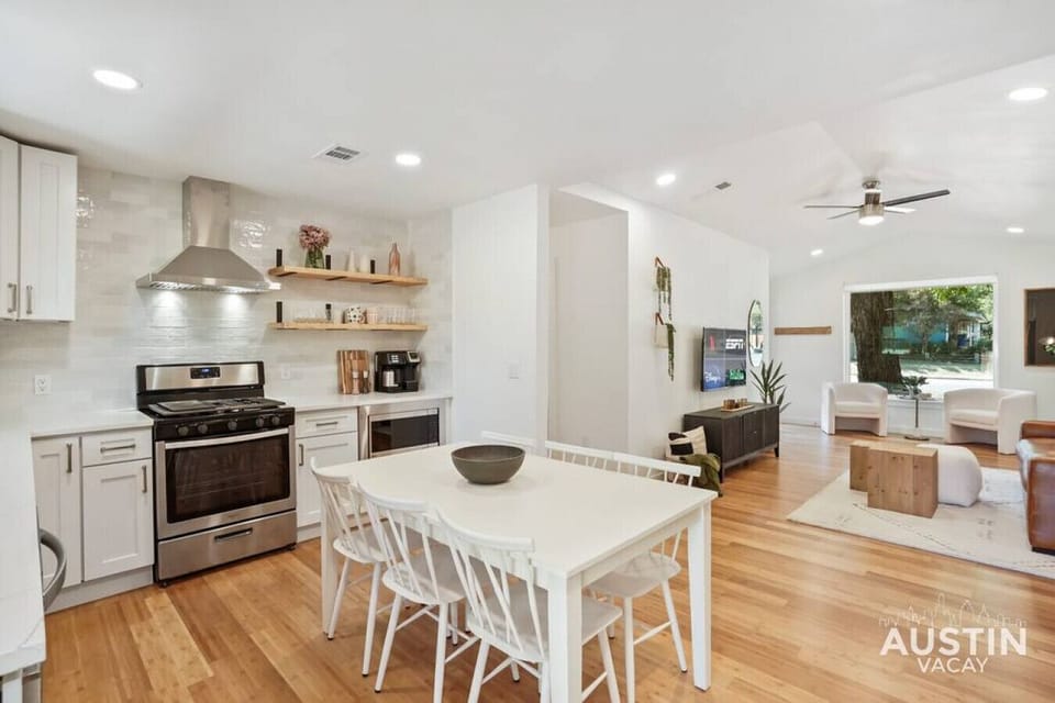 Fully equipped kitchen with microwave, coffee maker, and full range