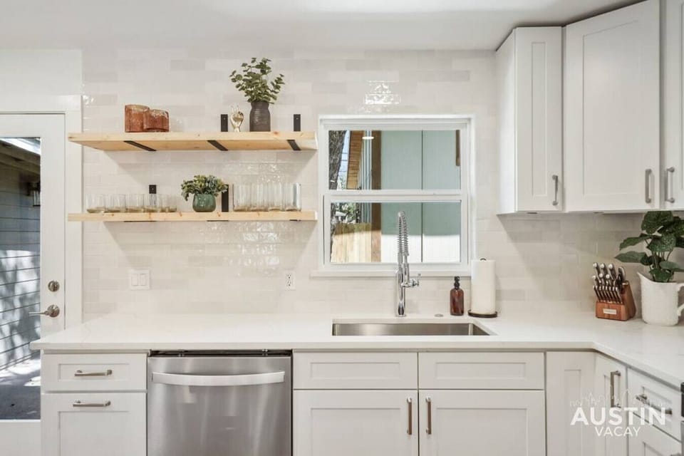 Fully equipped kitchen with microwave, coffee maker, and full range