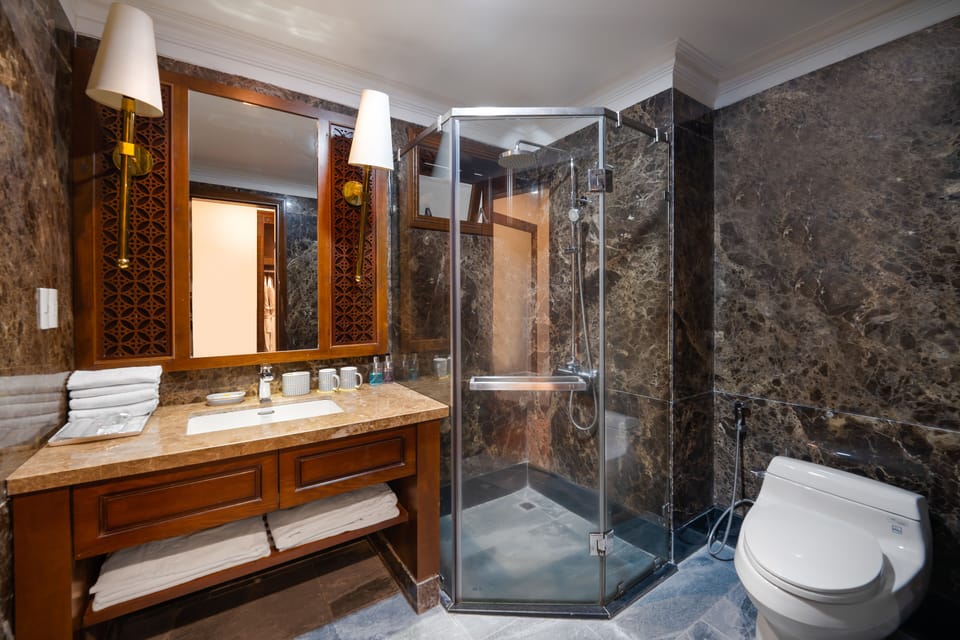 Luxury Penthouse | Bathroom | Hair dryer, bathrobes, slippers, towels