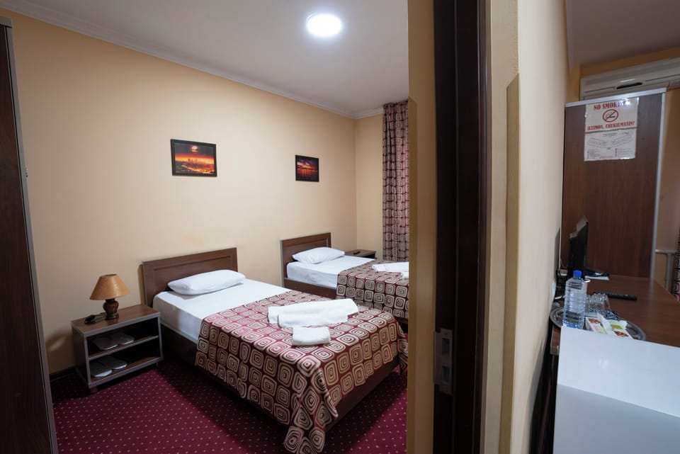 Standard Quadruple Room | Premium bedding, in-room safe, desk, iron/ironing board (on request)