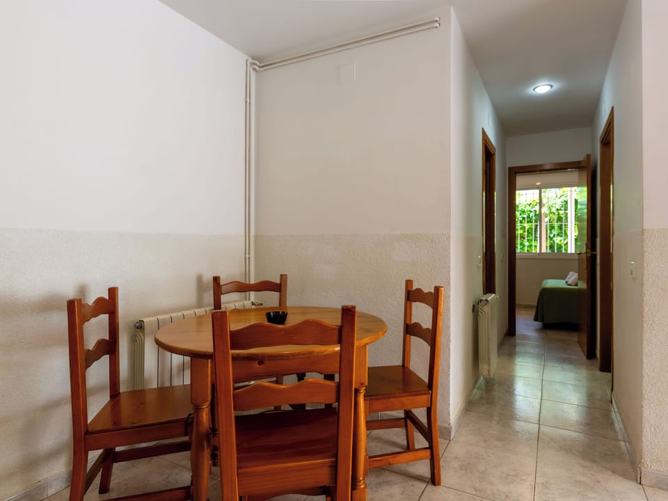 Standard Apartment | Living area | 30-inch TV with satellite channels