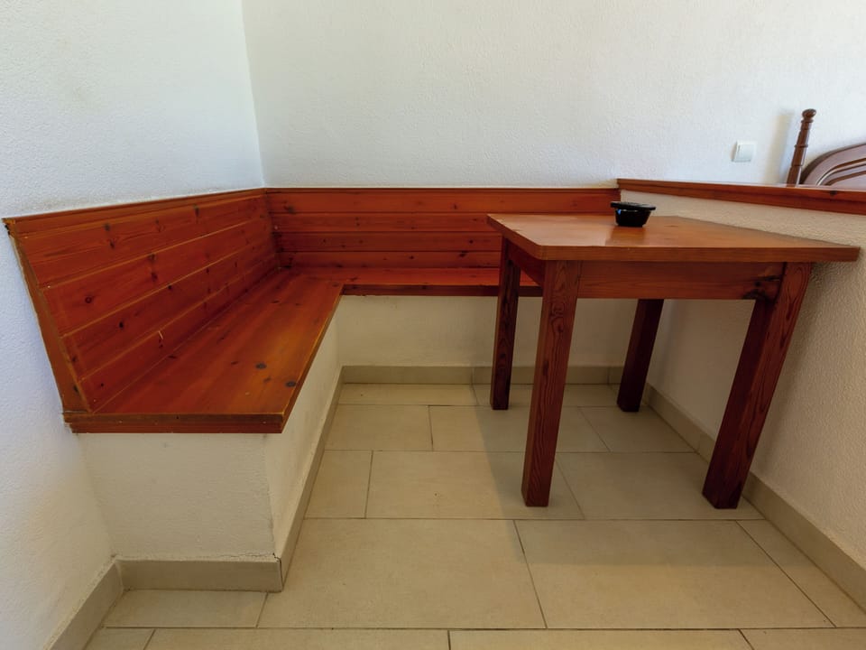 Economy Studio | Living area | 30-inch TV with satellite channels